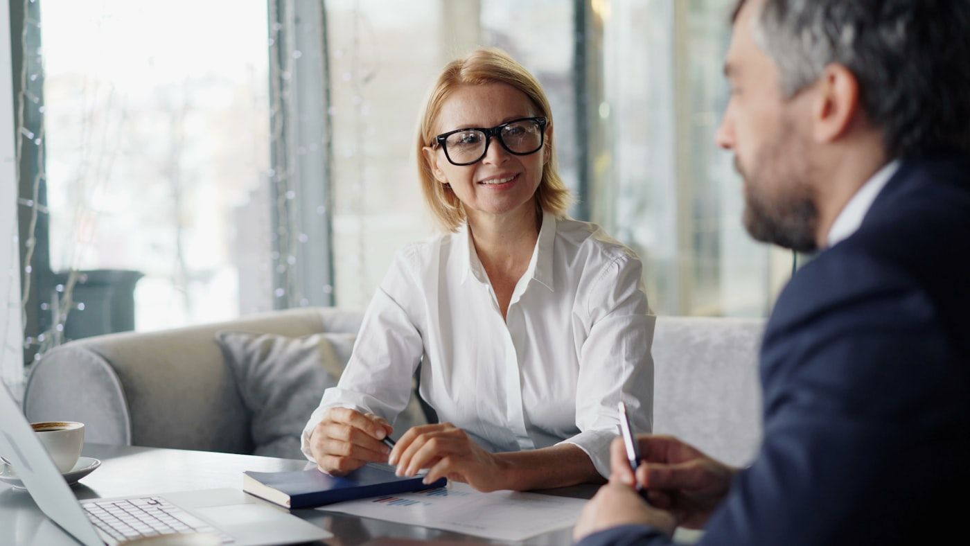An adviser talking a client through their options