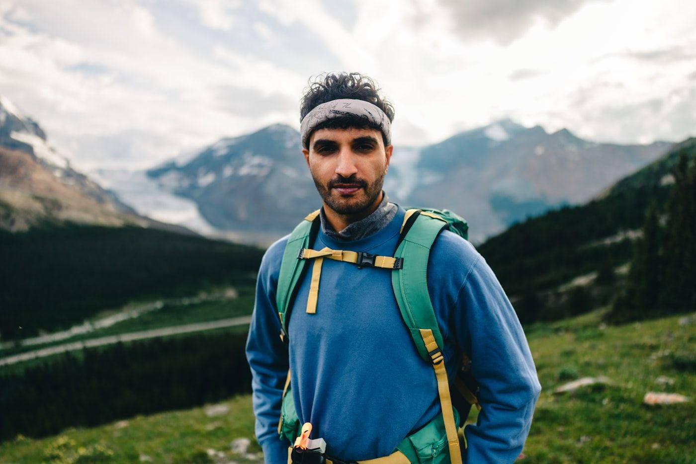 A walker on a mountain trail